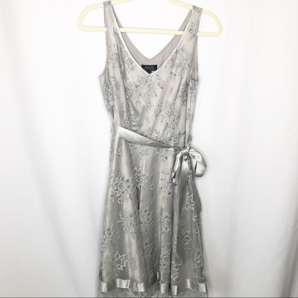 Taharu silver sleevless dress flare size 8